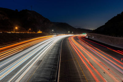 Light trails on road at night