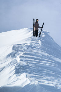 People on snow covered mountain