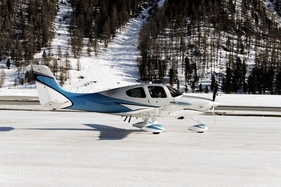 A private propeller jet landing at the engadine st moritz airport