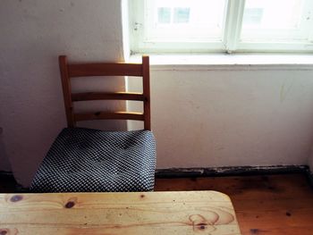 Close-up of chair on hardwood floor