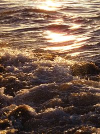 Full frame shot of sea at sunset