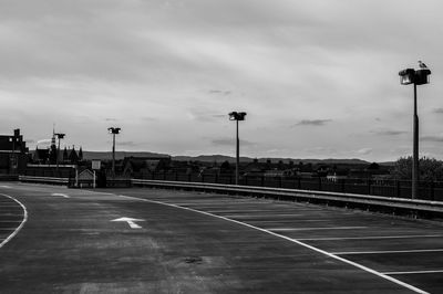 Empty parking lot against sky