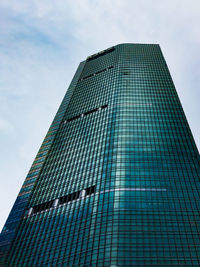 Low angle view of modern building against sky