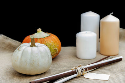 Close-up of food on table against black background