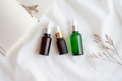 High angle view of bottles on table