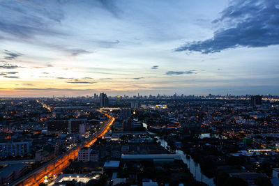 High angle view of cityscape against sky during sunset