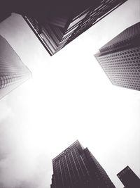 Low angle view of modern office building against sky