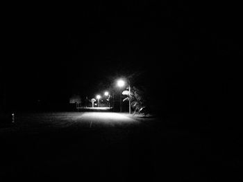 Illuminated street light at night