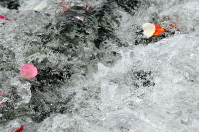 High angle view of frozen ice on river