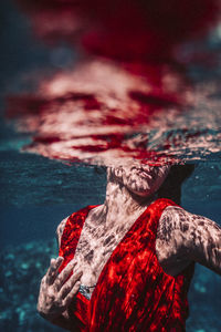 Digital composite image of person on sea shore