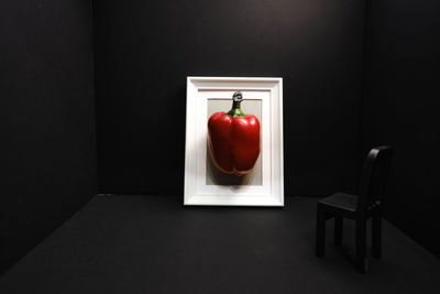 Close-up of red fruit on table