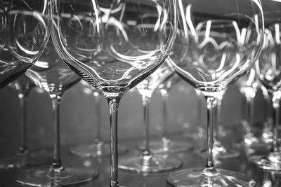 Close-up of wine glasses on table