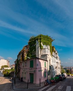 Buildings in city against sky