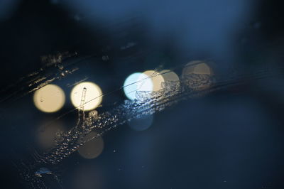 Close-up of illuminated water at night