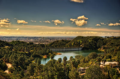 Scenic view of lake against sky during sunset