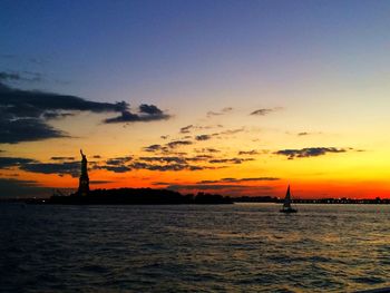 Scenic view of sea at sunset