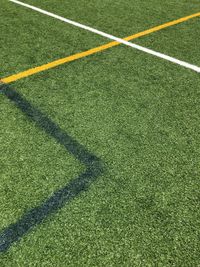 High angle view of soccer field during sunny day