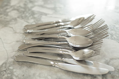 High angle view of drinking glasses on table