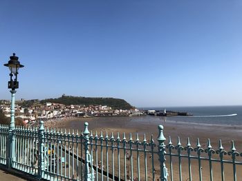 Scenic view of sea against clear blue sky