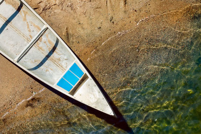 High angle view of canoe on beach