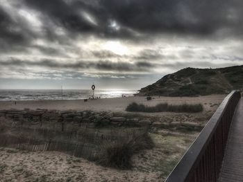 Scenic view of beach against sky