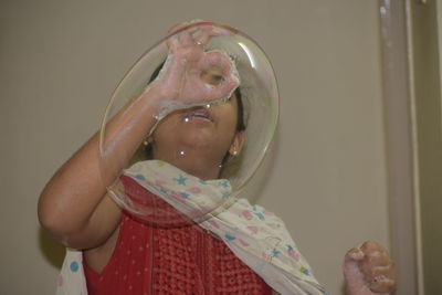 Portrait of girl holding ice cream