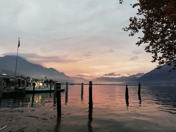 Scenic view of lake against sky during sunset