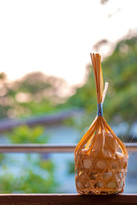 Close-up of ice cream hanging on railing