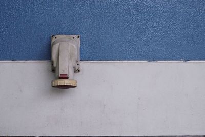 Close-up of pipe on wall