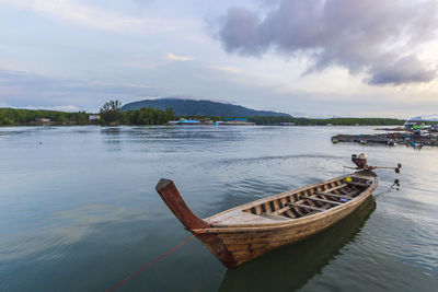 Long tail boat in samchong canal at phang nga, thailand.