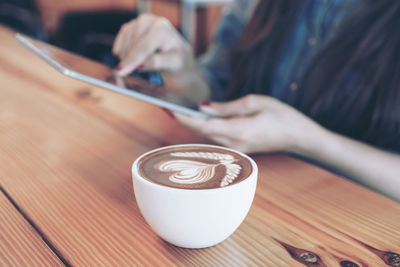 Coffee cup on table