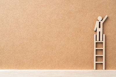 Low angle view of empty paper against white background