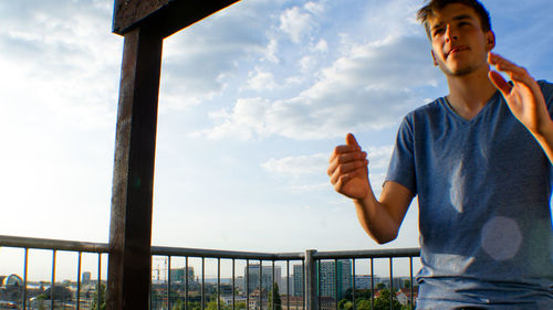 Low angle view of man against sky