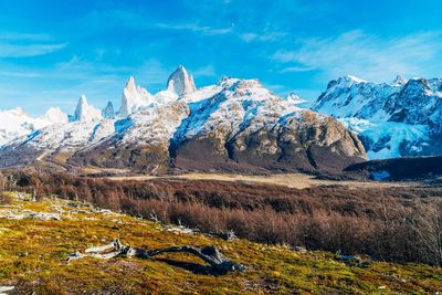 Scenic view of mountains against sky during winter