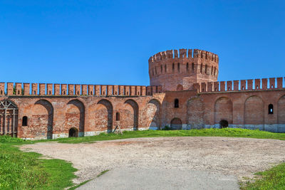 View of historical building against clear blue sky