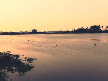 View of lake against sky during sunset