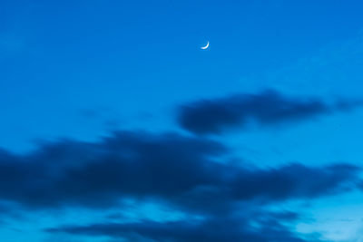 Low angle view of moon in sky