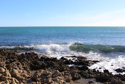 Scenic view of sea against clear sky