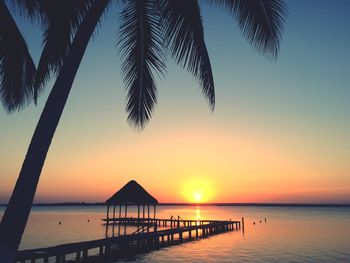 Scenic view of sea at sunset