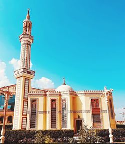 Low angle view of church against clear blue sky