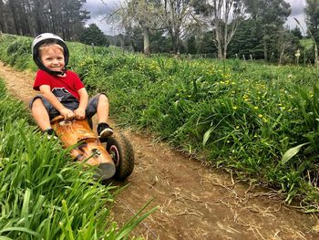 Portrait of boy smiling in park
