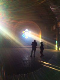 Blurred motion of woman in tunnel