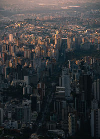 High angle view of buildings in city against sky