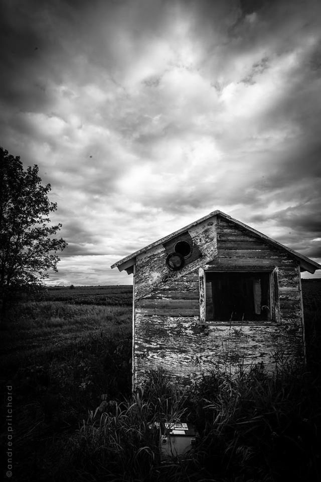 architecture, built structure, sky, building exterior, cloud - sky, house, cloudy, abandoned, field, cloud, grass, damaged, landscape, run-down, weather, old, obsolete, overcast, deterioration, residential structure