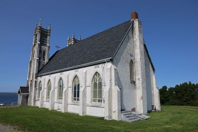 Low angle view of church against clear sky