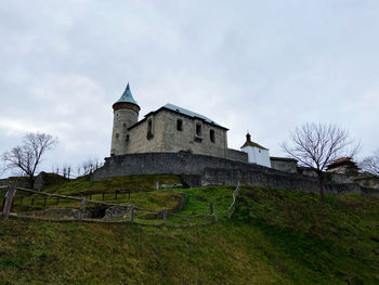 Low angle view of historic building against sky