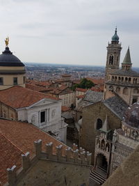 View of old building in city against sky