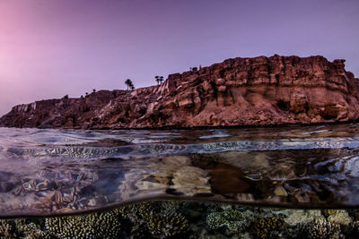 Scenic view of rock formation against sky