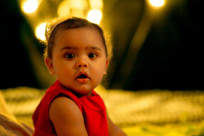 Portrait of cute baby looking away