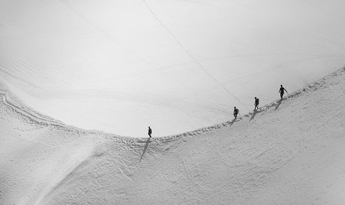 People on snow covered mountain